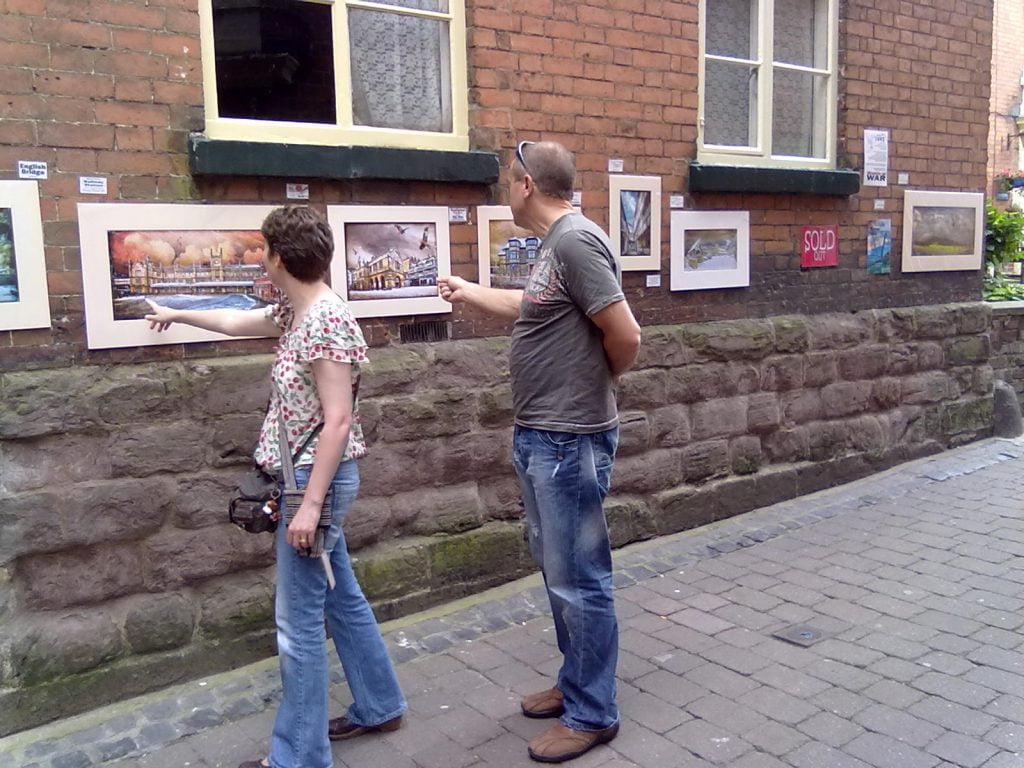 There and there Gwendda the Witch Photographer in College Street, Ludlow