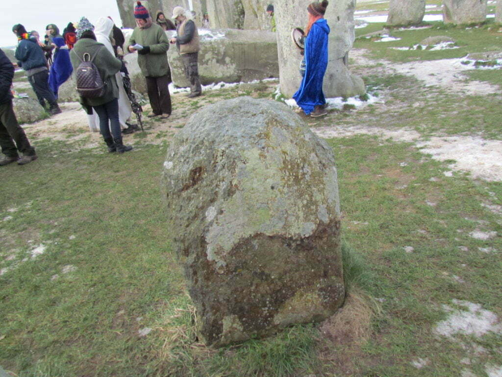 A bluestone. Stone 46, Stonehenge. Rhyolite is an extrusive igneous rock with a very high silica content. It is usually pink or gray in color with grains so small that they are difficult to see without a hand lens.