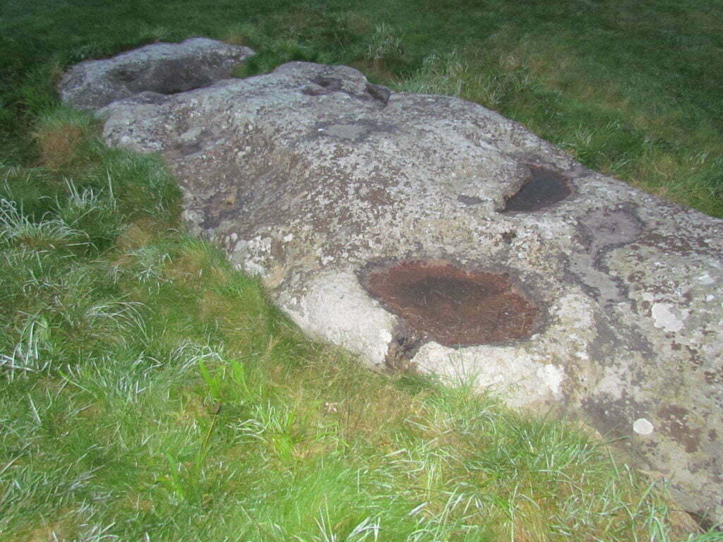 Slaughter Stone, Stonehenge. Showing the iron rusting in hollows, covered with a layer of ice - it was cold, pre solstice morning.