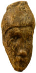 Ivory carving of a Pavlovian Culture shamanka with deformity around her eye 27,000 years old. It is the oldest artistic portraiture.