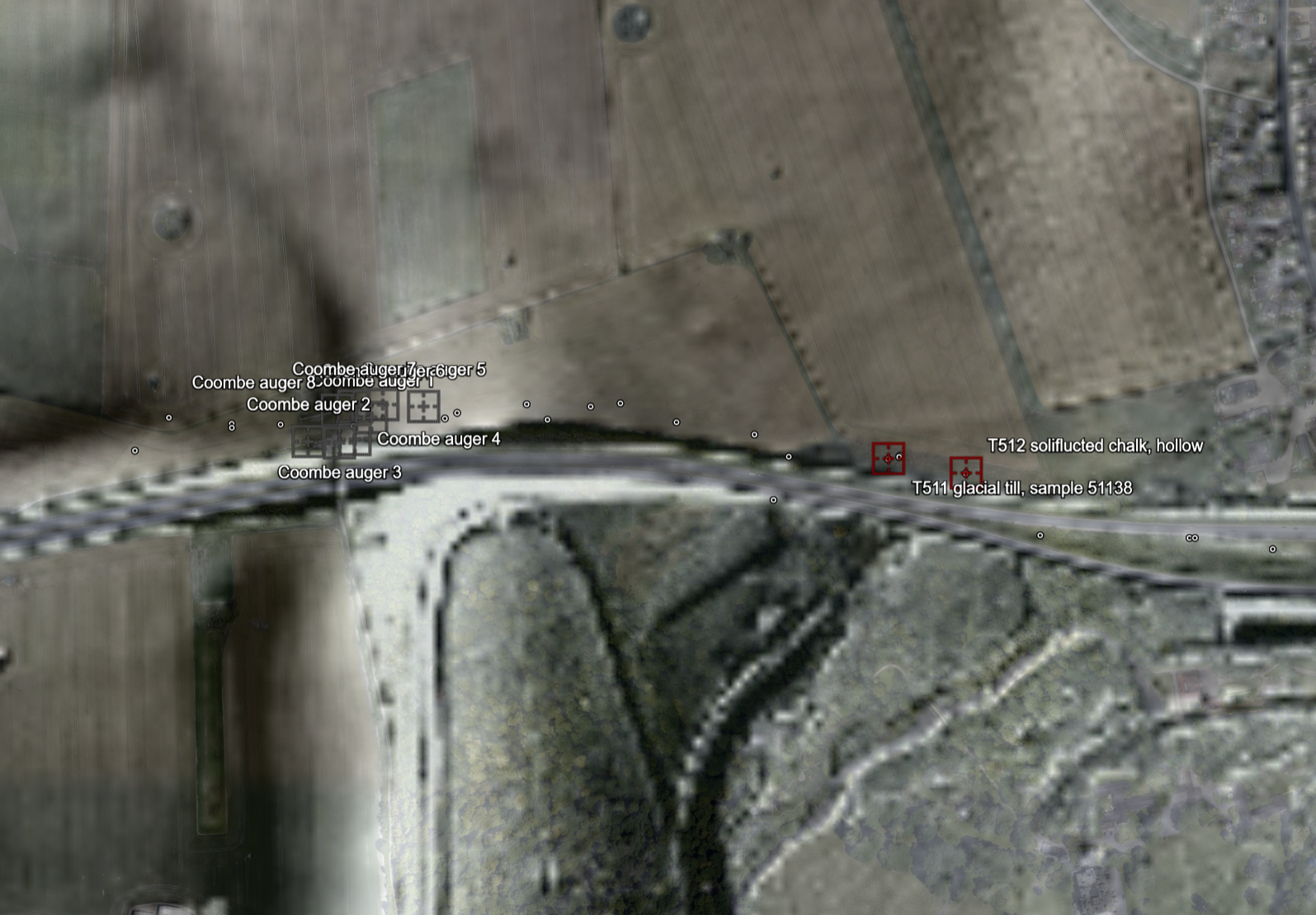 LiDAR relief image of a coombe with clustered grey auger markers and two red trench markers, wooded Vespasian's Camp below