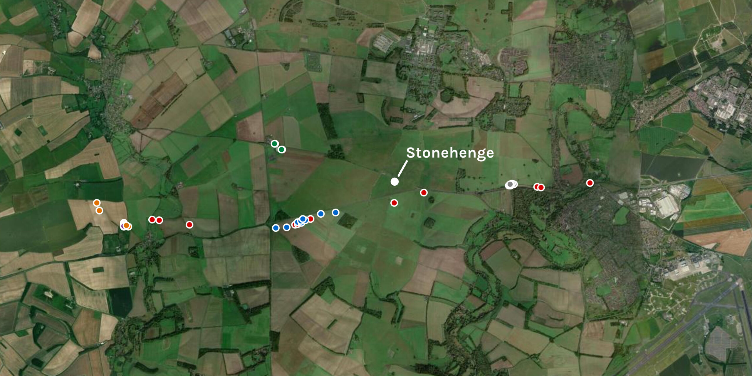 Satellite map of the Stonehenge landscape with 44 coloured dots along the A303 corridor